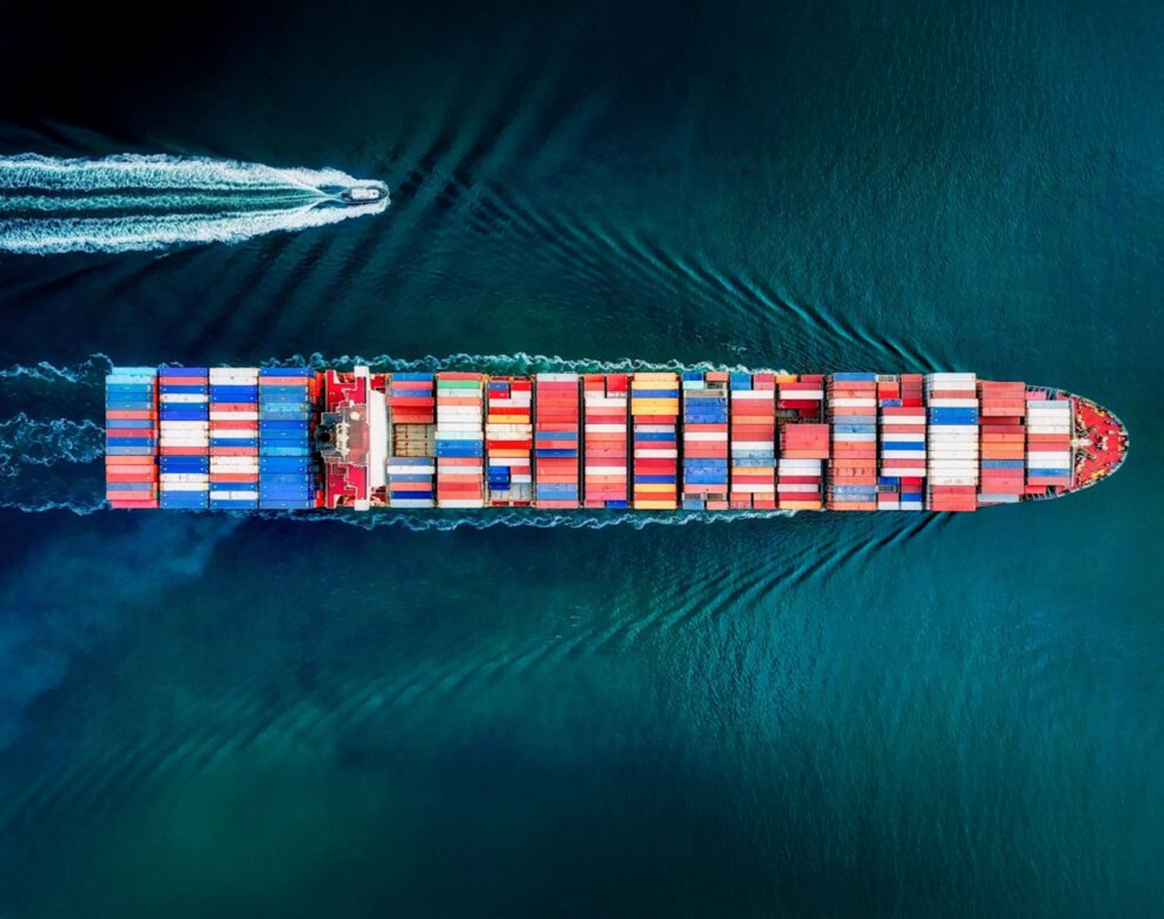 Picture of a cargo ship taken from above for Port Authority of NSW Vocus Customer Story