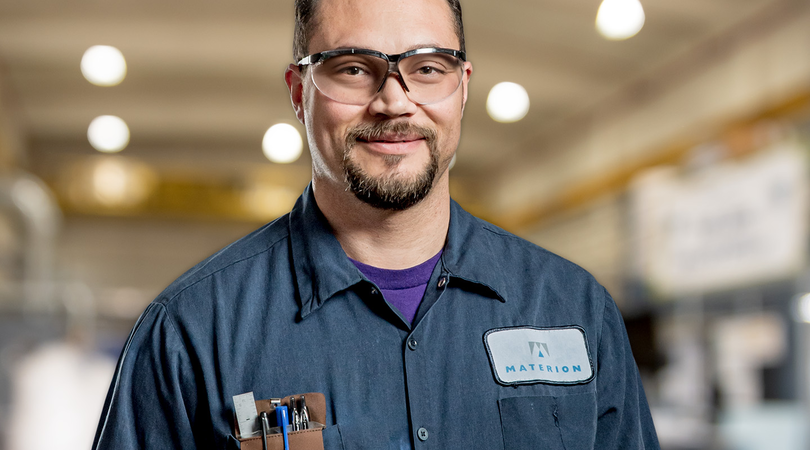 Materion employee with safety glasses and pocket protector