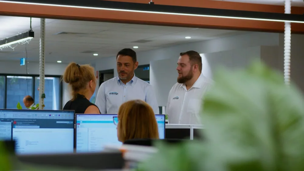 Photo of three Whitsunday Council Workers in office
