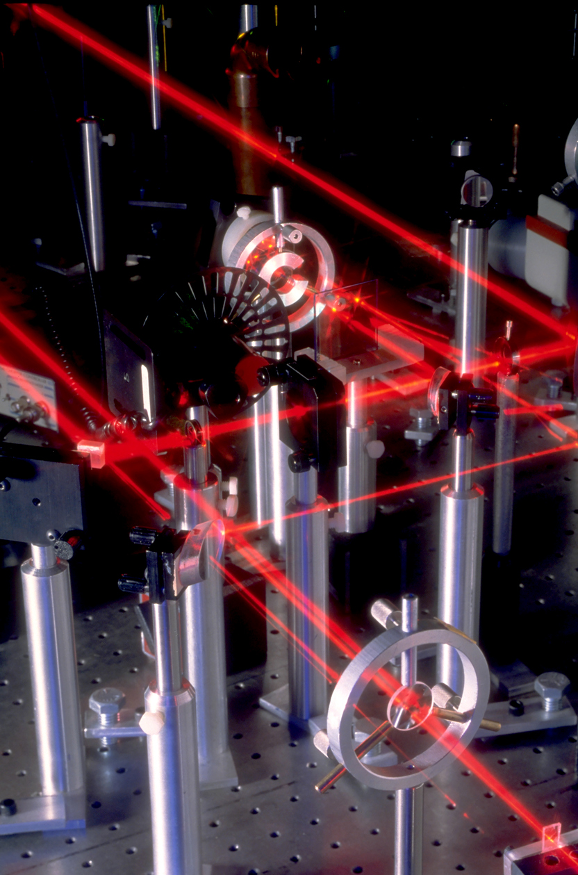 Red laser utilizing technical ceramics in lab machinery in operation 