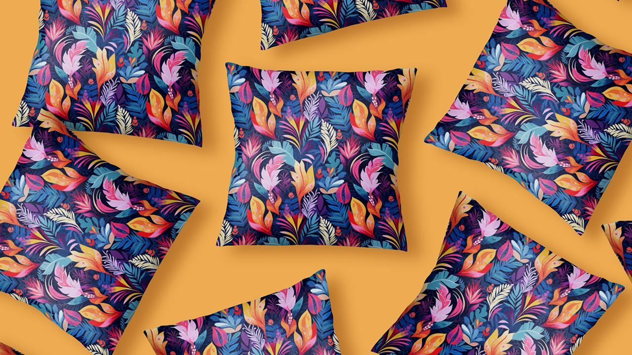 A group of pillows with colorful feathers on themAI-generated content may be incorrect.