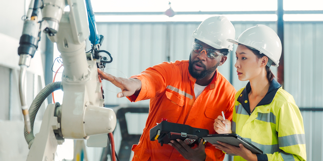 Diversity Professional Engineer training and discussing in Robot Development Plant