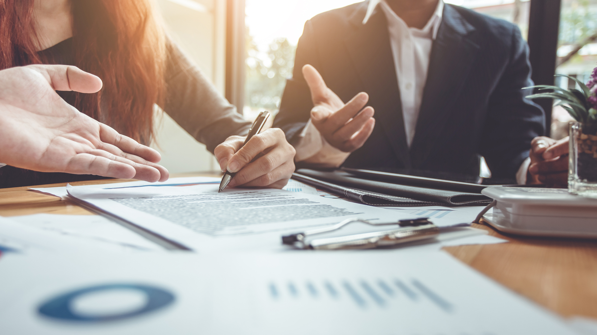 Business Signing a Contract Buy - sell house.