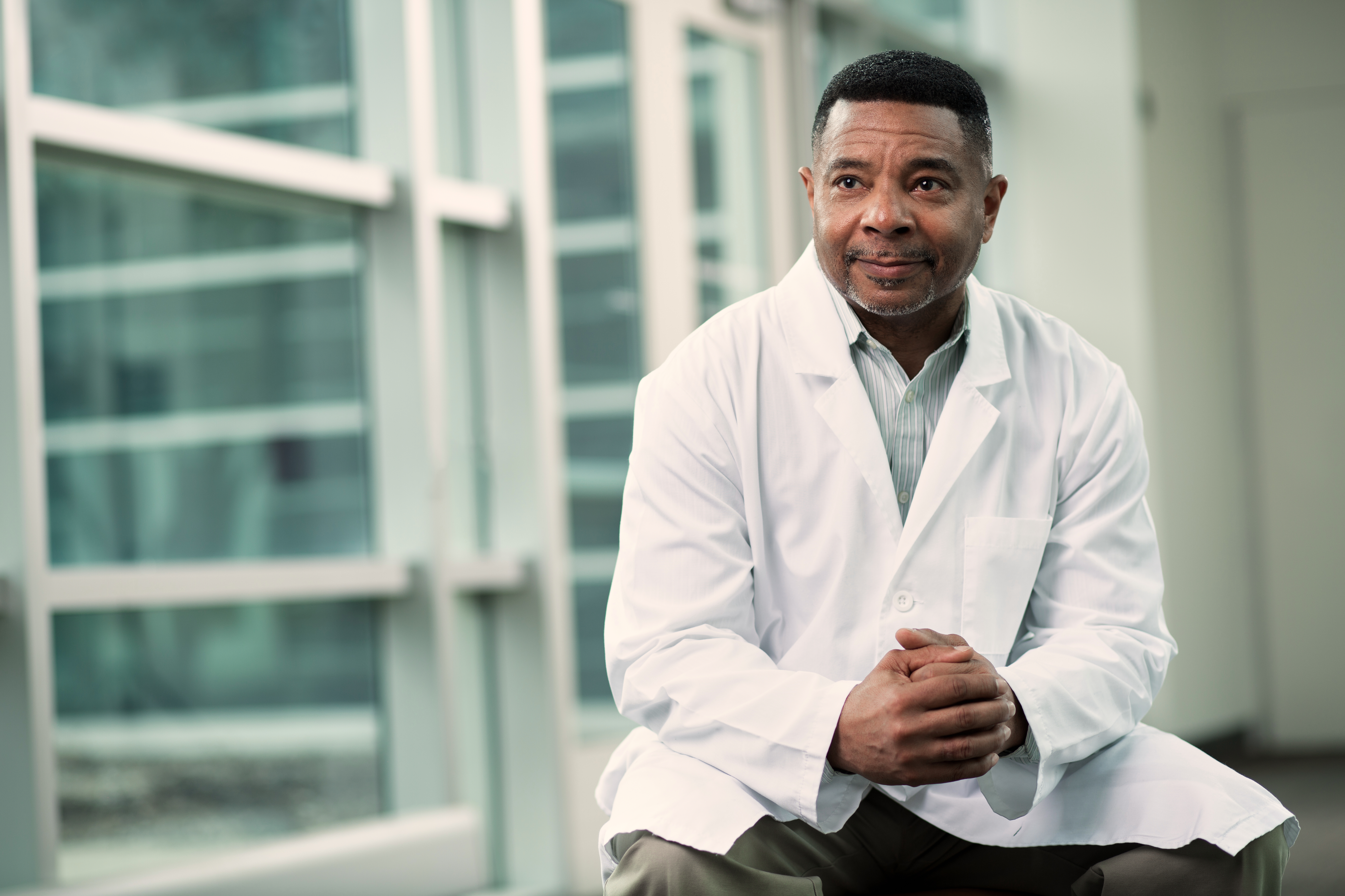 A radiologist sits in a lobby