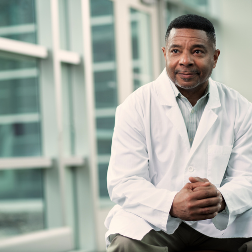 A radiologist sits in a lobby