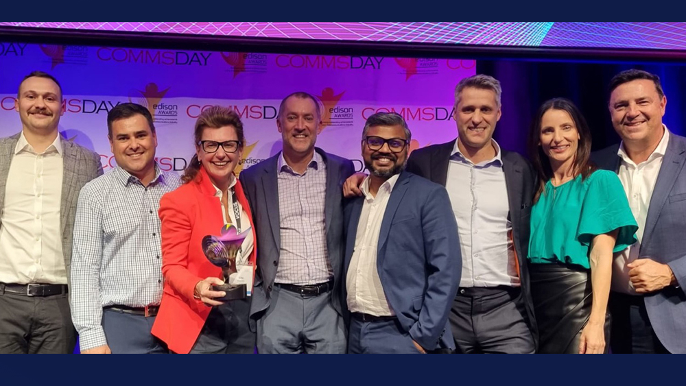 Photo of Vocus team posing with their award for Best Sustainability Initiative at Comms Day 2023