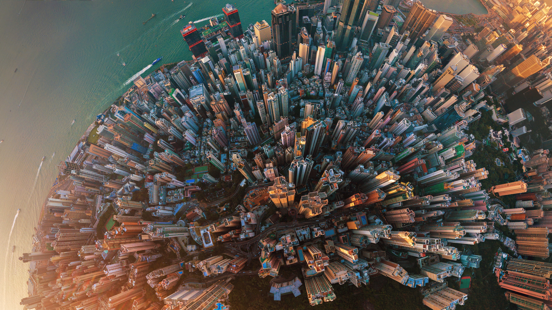 Little planet. Aerial view of Hong Kong Downtown. Financial district and business centers in smart city in Asia. Top view. Panorama of skyscraper and high-rise buildings.