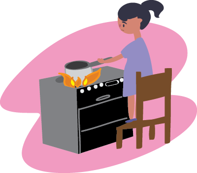 Child standing on a chair over an oven holding a pot on an open flame