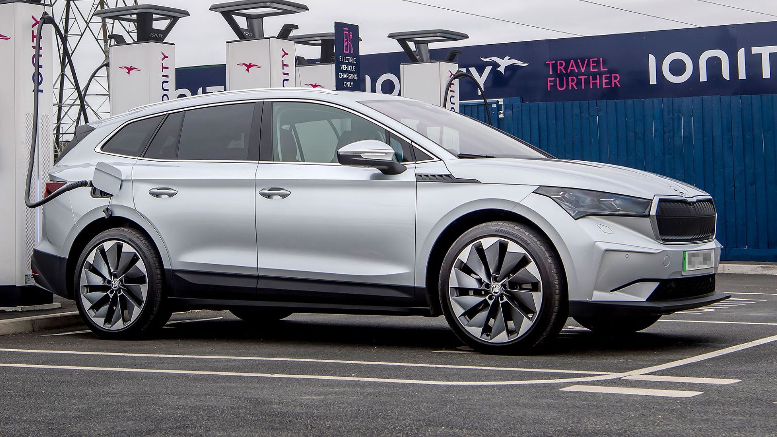 The silver Skoda Enyaq car parked