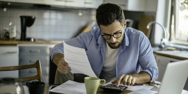 man at laptop with coffee mug.jpg