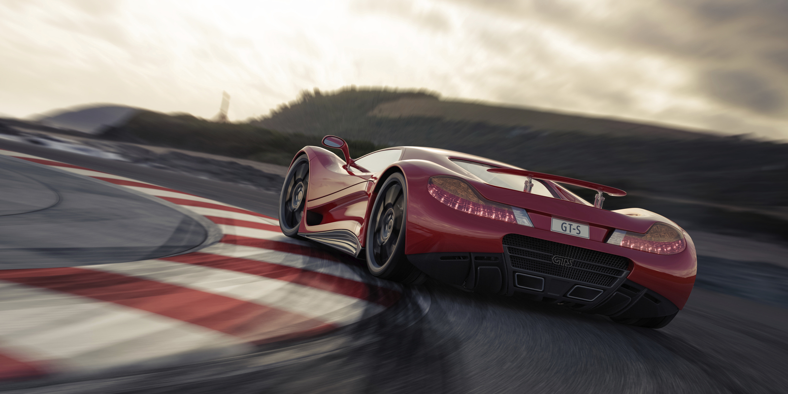 Red sports racing car on racetrack