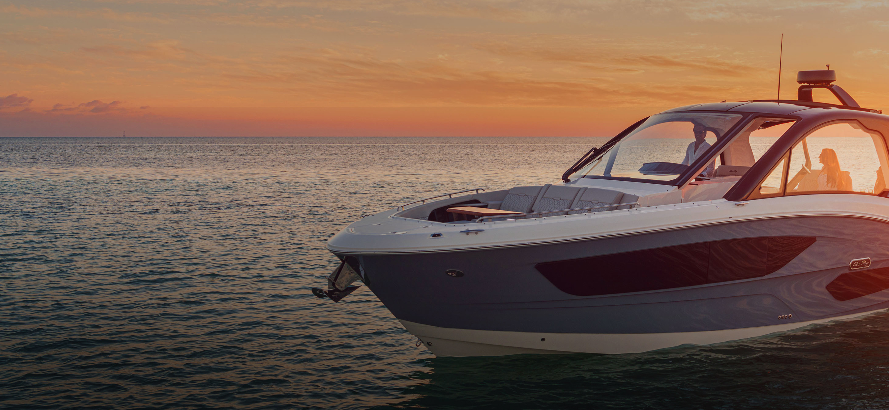 A speedboat in the sunset