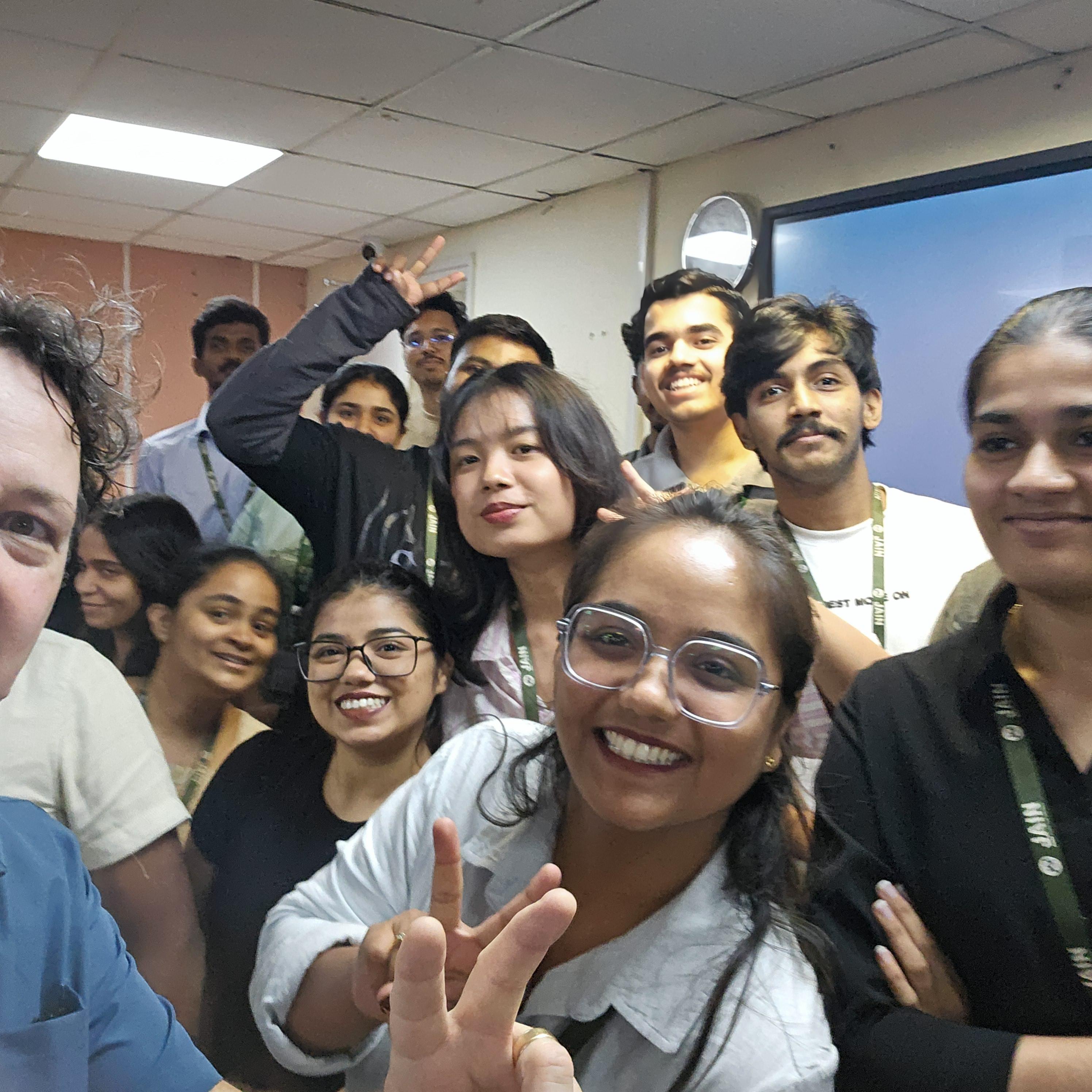 Selfie of James Stanger with group of learners