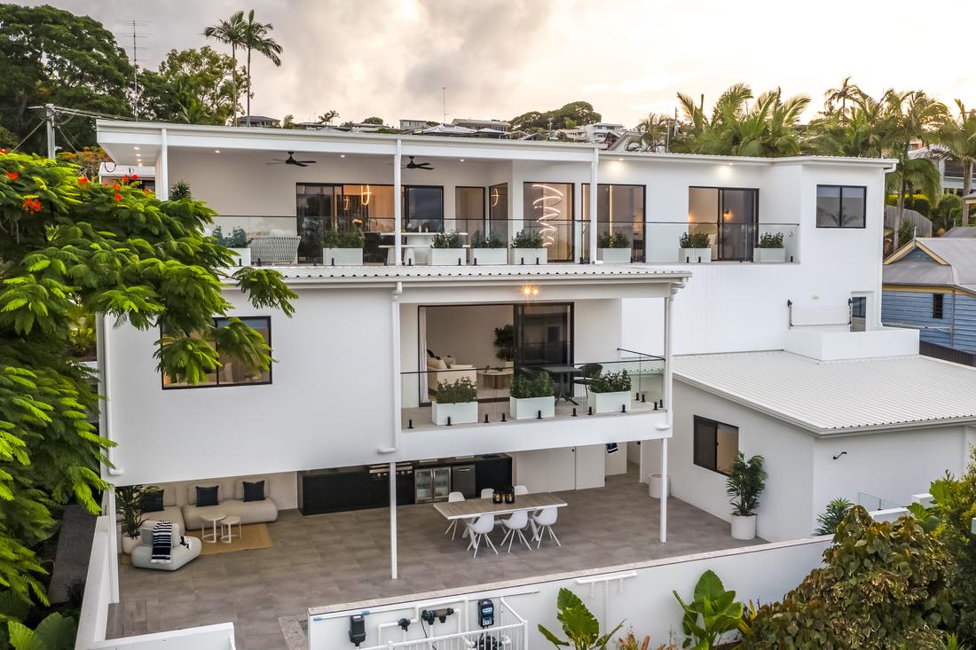 External Image showing three levels of the home at dusk