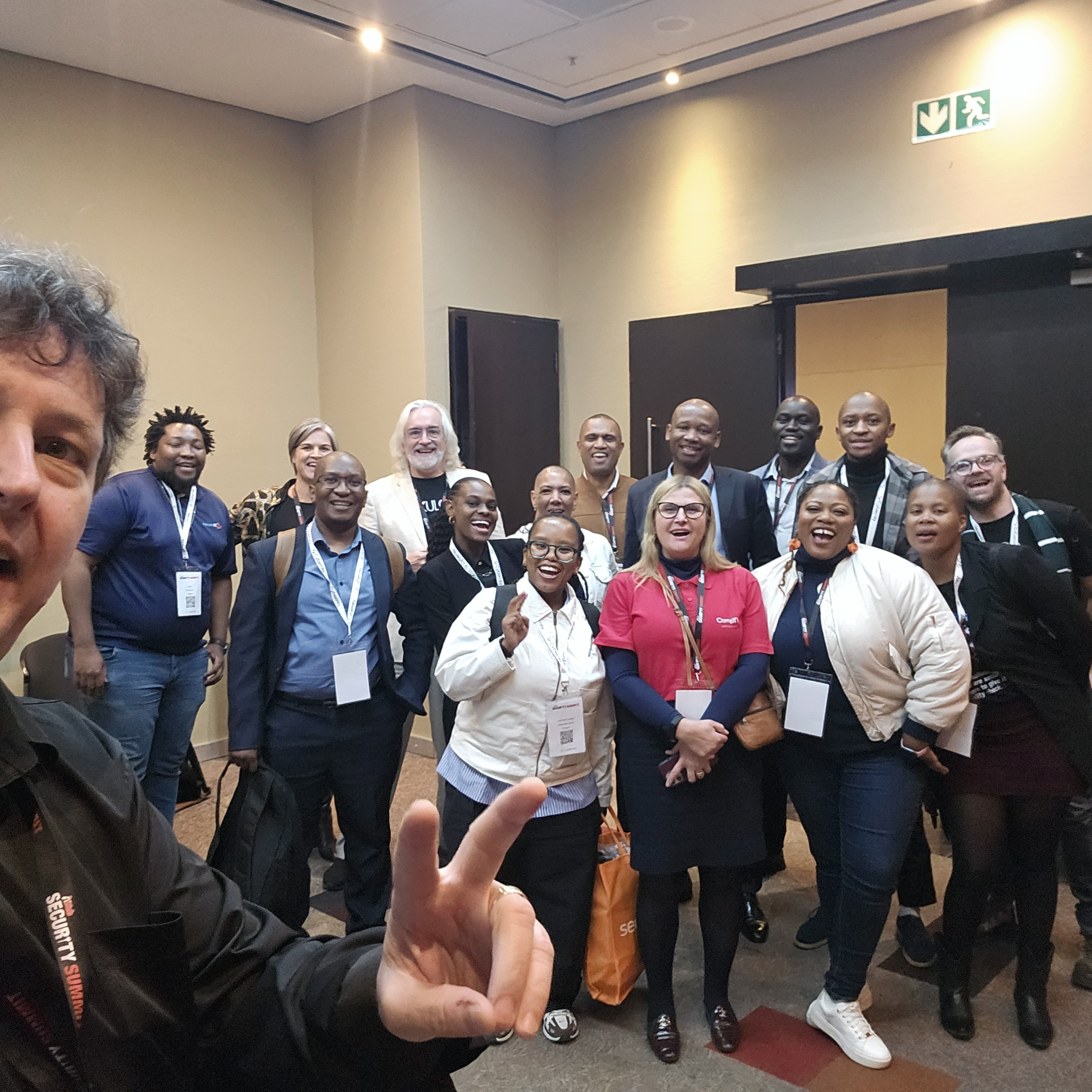Selfie of James Stanger with group of learners