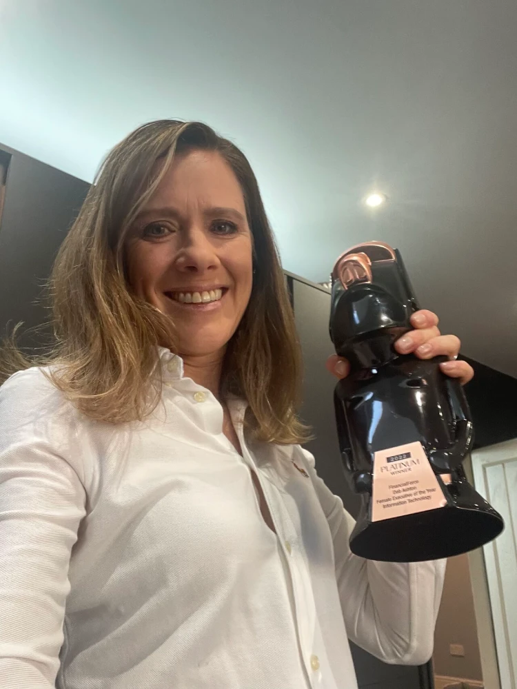 Deb Ashton winning a Female Executive of the Year Award in 2022