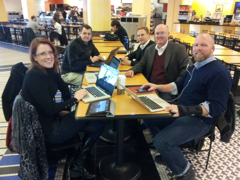 Certinia staff working at a local Starbucks