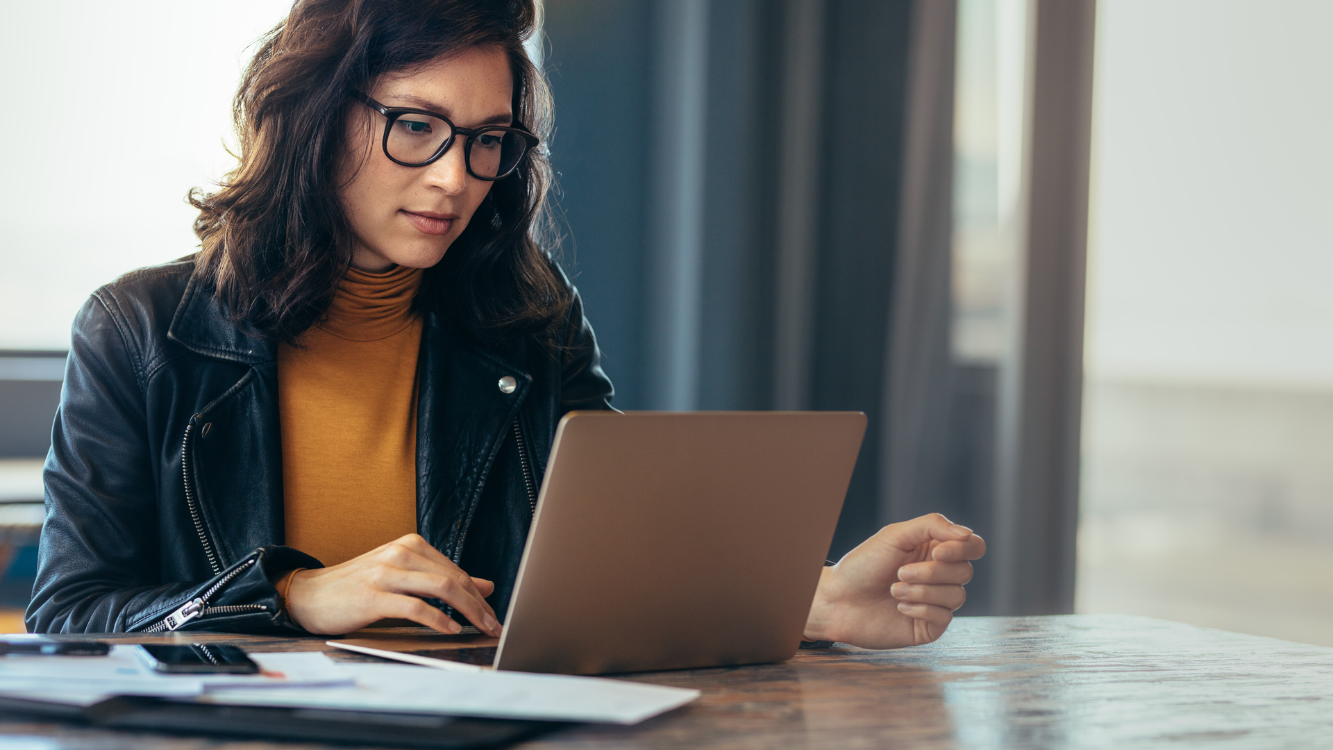 Asian woman working laptop at office