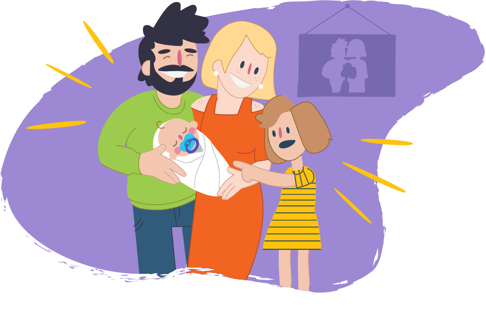 Parents standing together smiling, holding a wrapped baby with their other child standing with them, pointing at the baby.