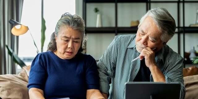 couple looking at papers.jpeg