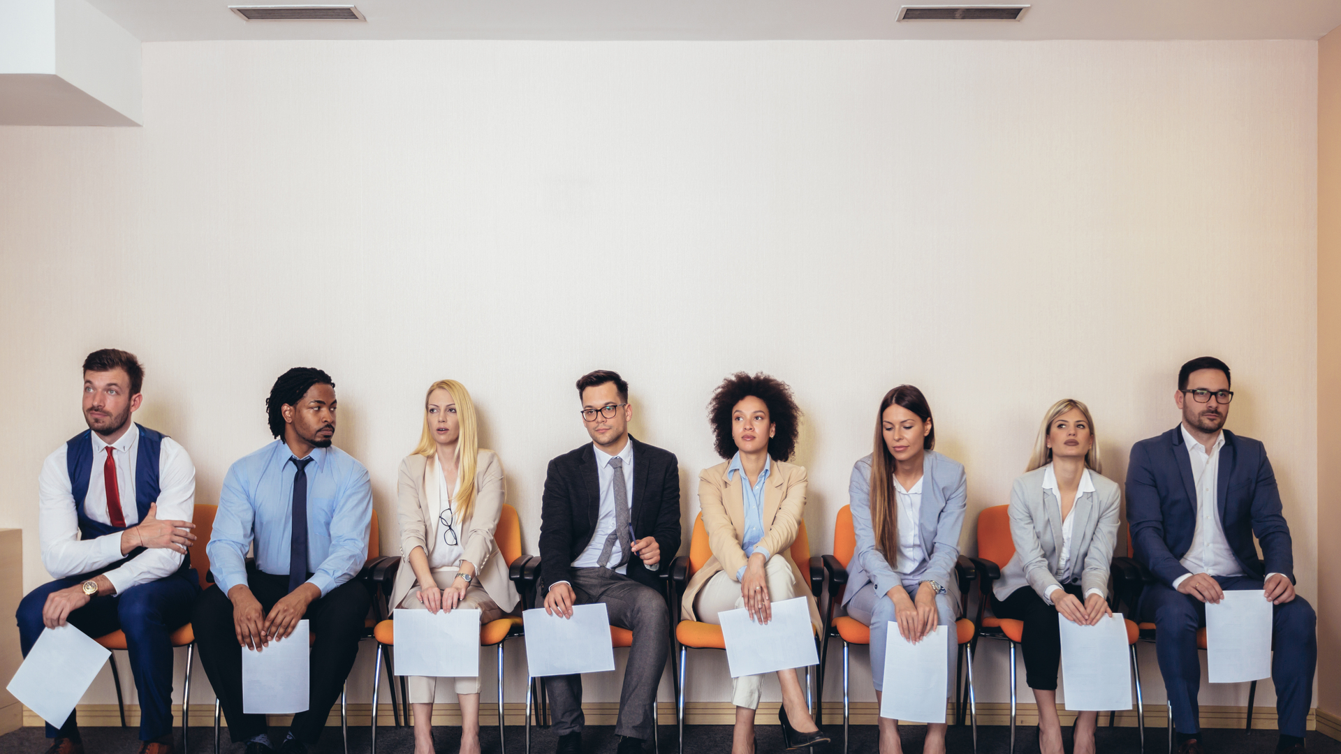 Photo of candidates waiting for a job interview.