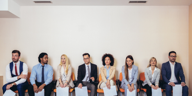 Photo of candidates waiting for a job interview.