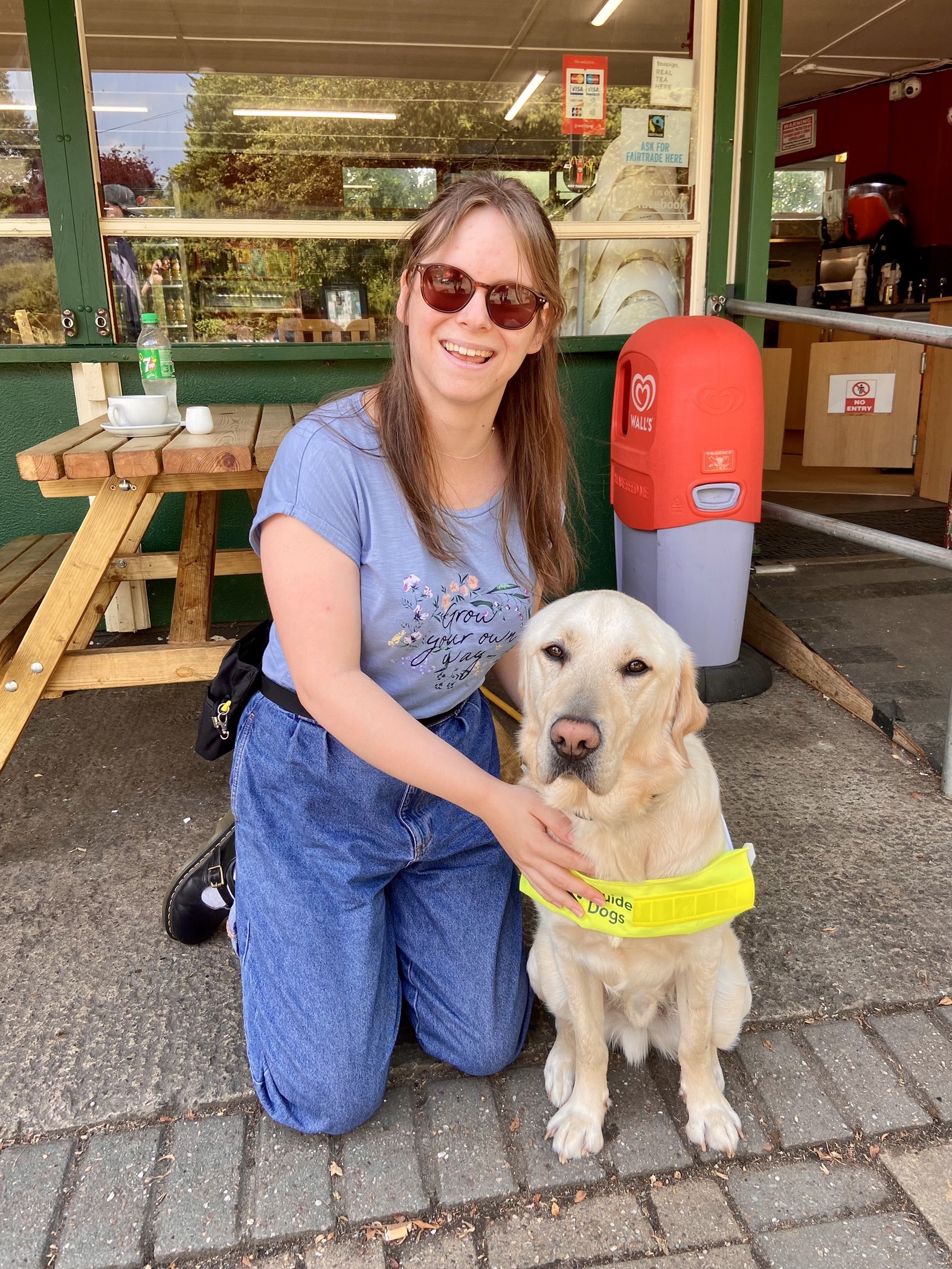 Disability blogger Chloe tear with her guide dog Lezzie
