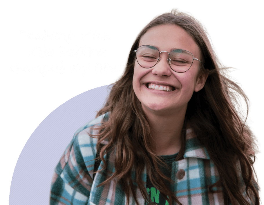 Teen smiling with the quote: &ldquo;talking with Kids Helpline changed my life.&rdquo;