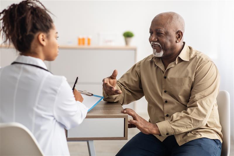 Female HCP with male patient.jpeg