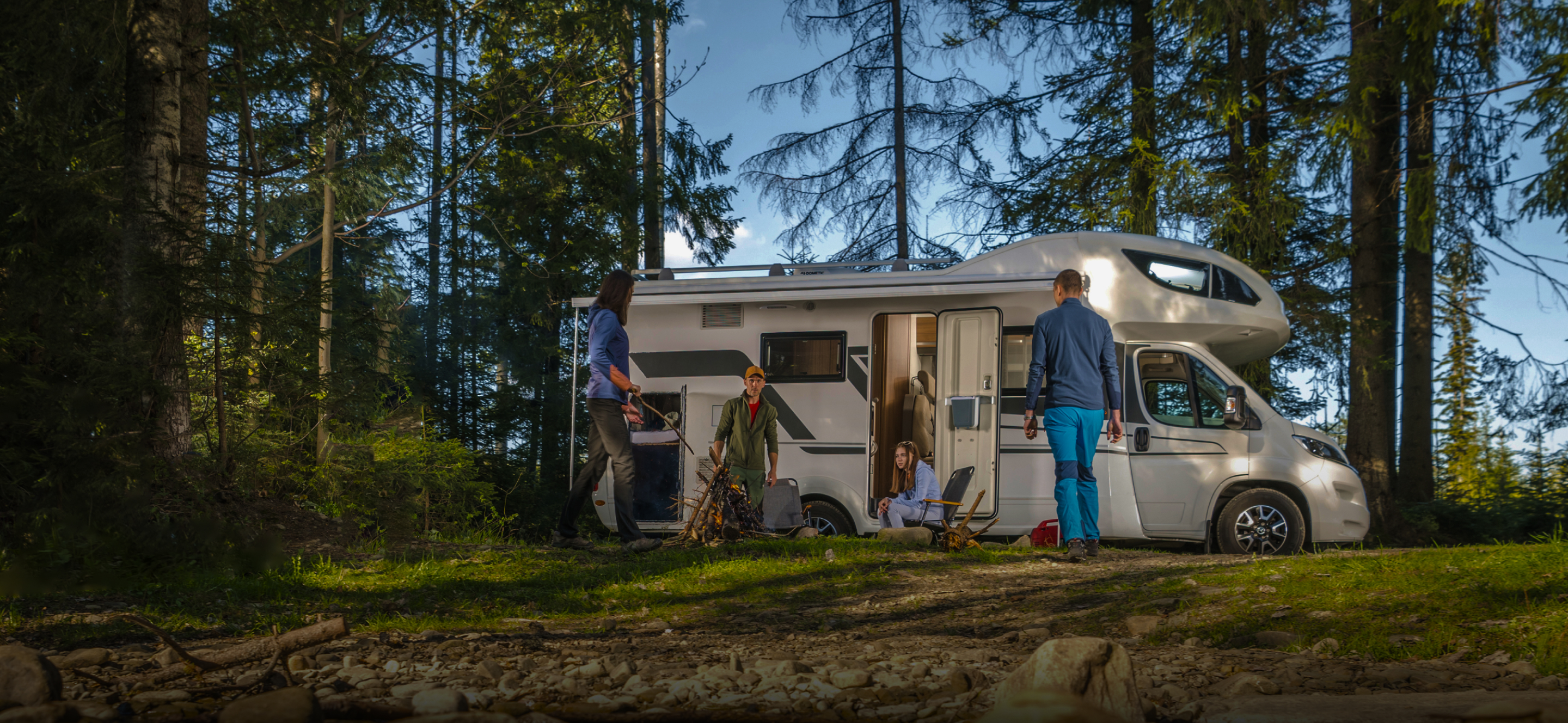 A campervan parked up at night time