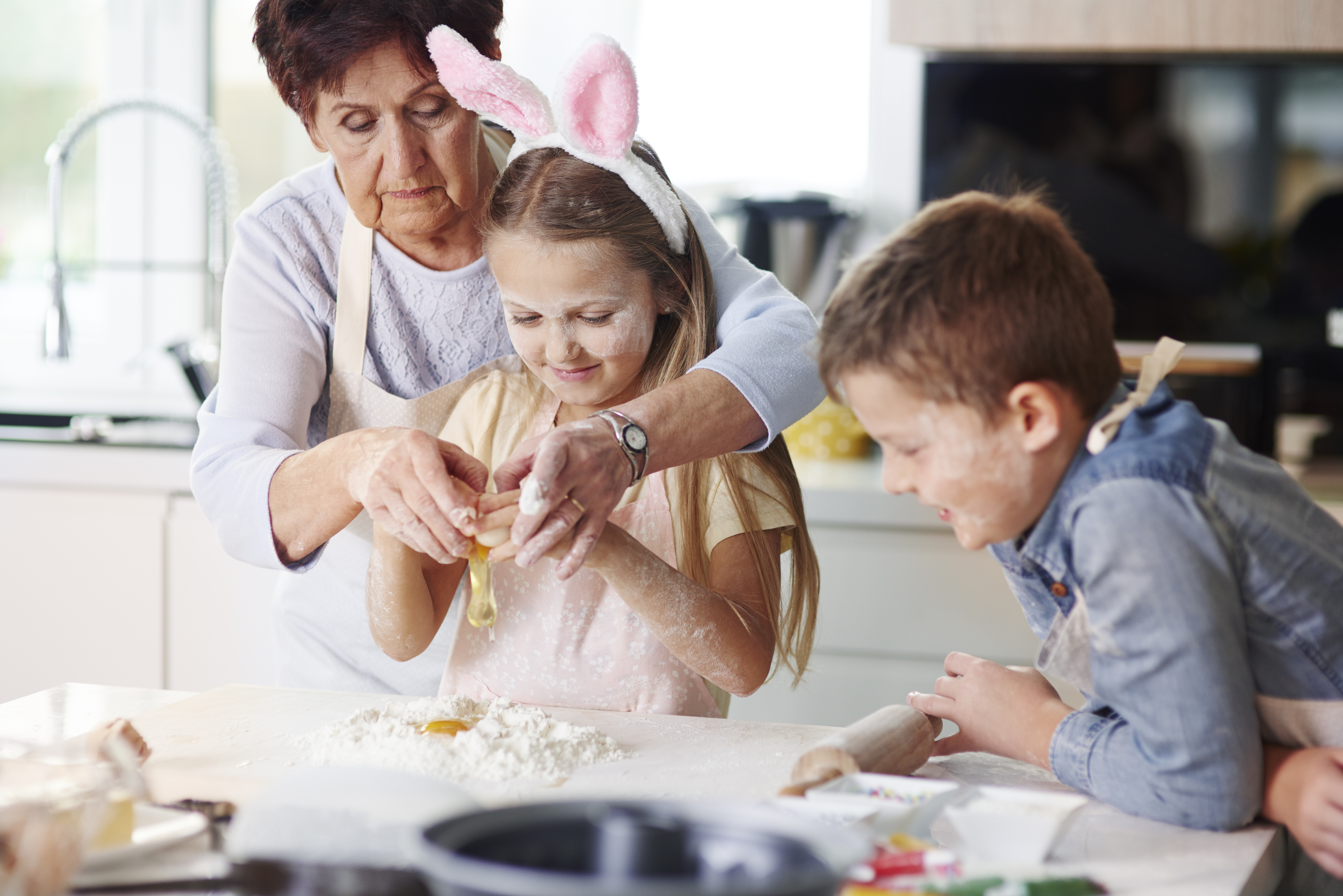 Grandmother baking with children