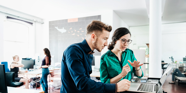 Startup Business Employees Working At The Office