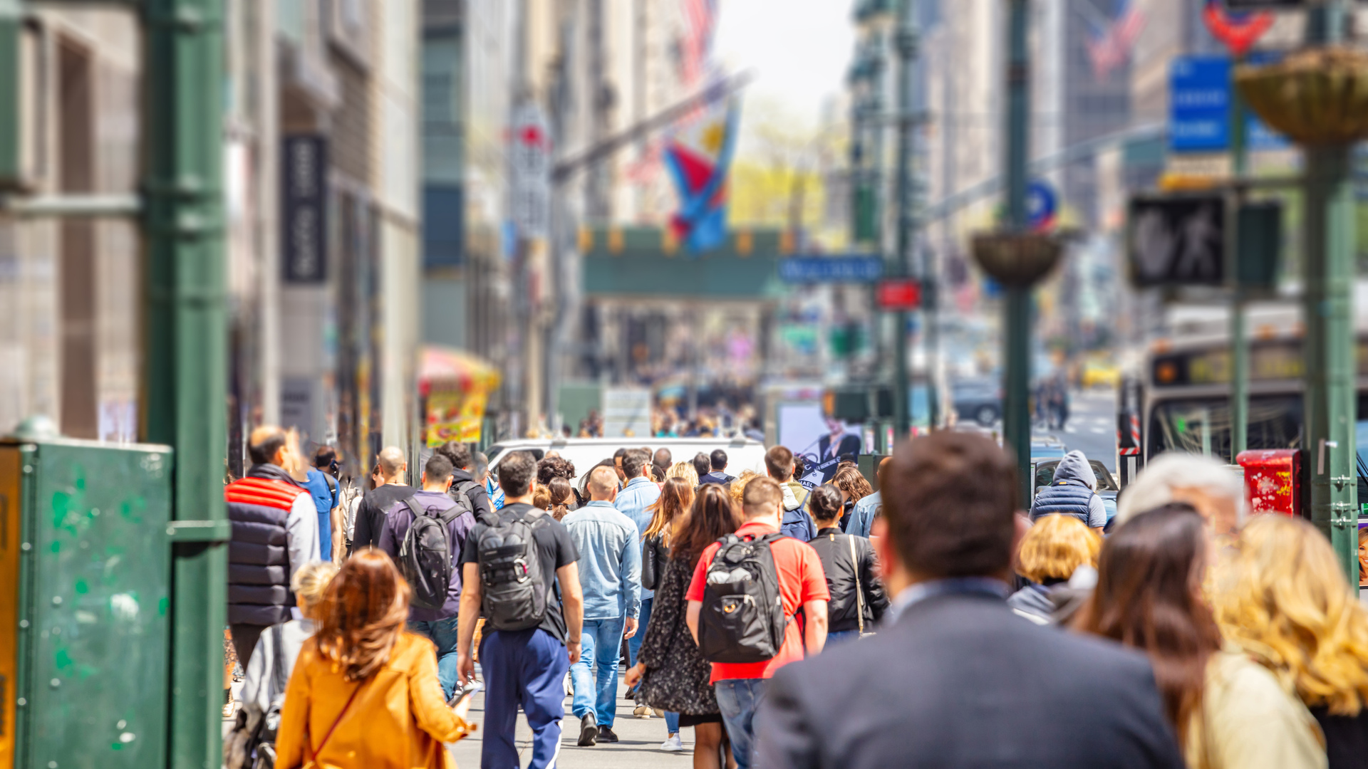 New York, streets. High buildings and crowd walking