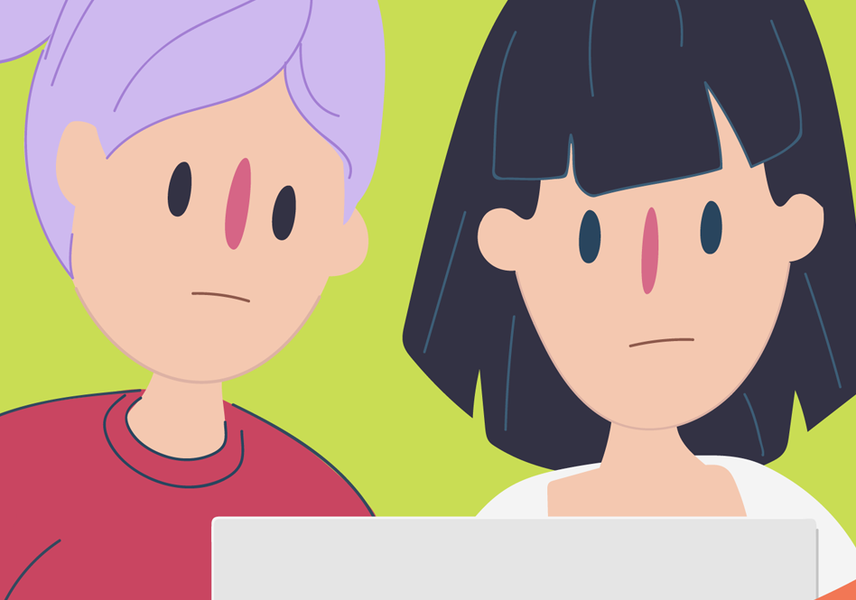 Two friends looking at a computer.
