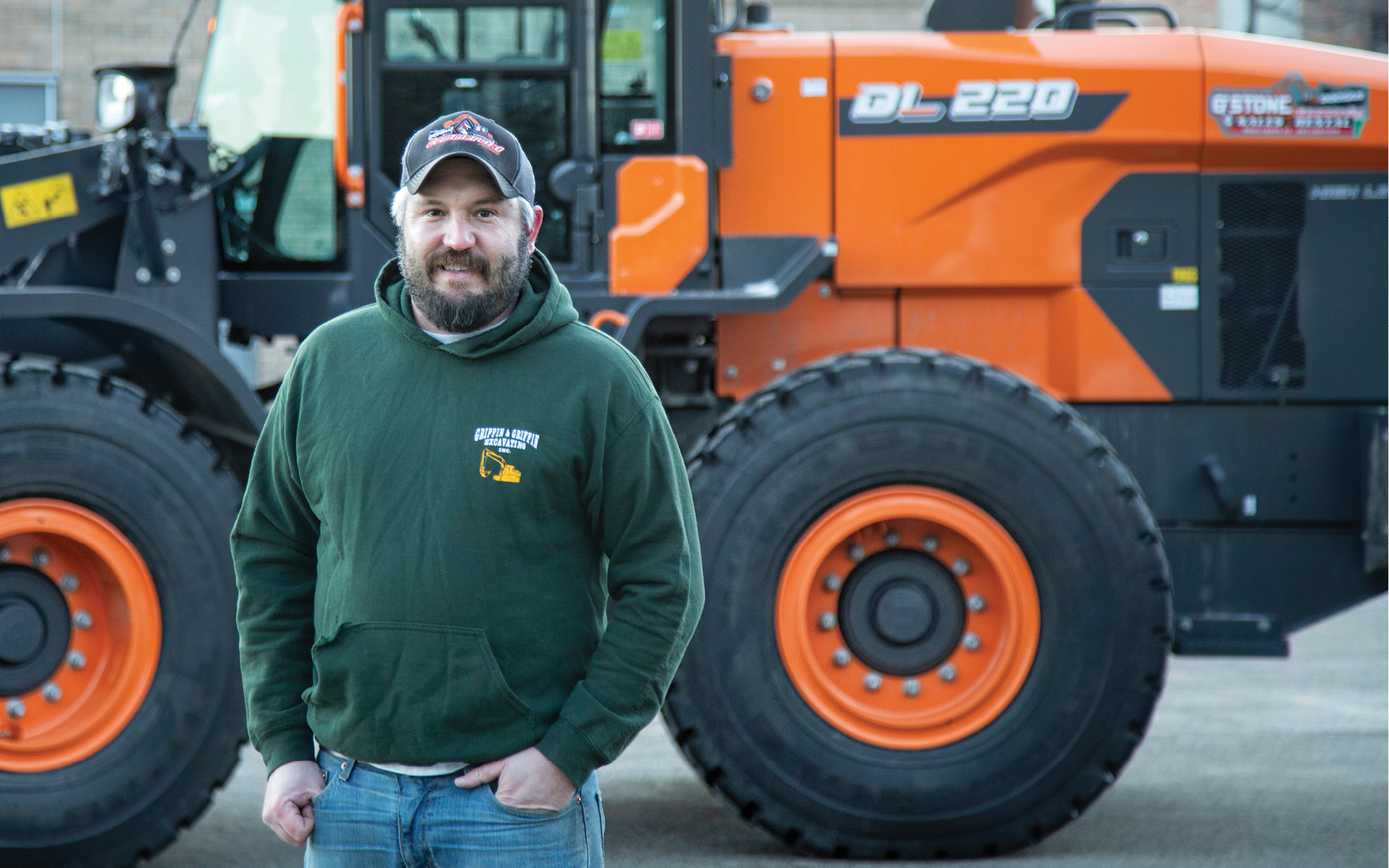 Chris Griffin of Griffin and Sons Excavating and his DEVELON DL220-7 wheel loader.