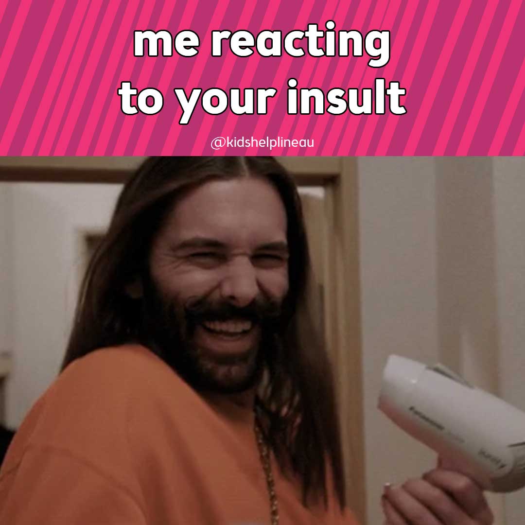A photo of a person holding a hair dryer, with text that reads “me reacting to your insult”.