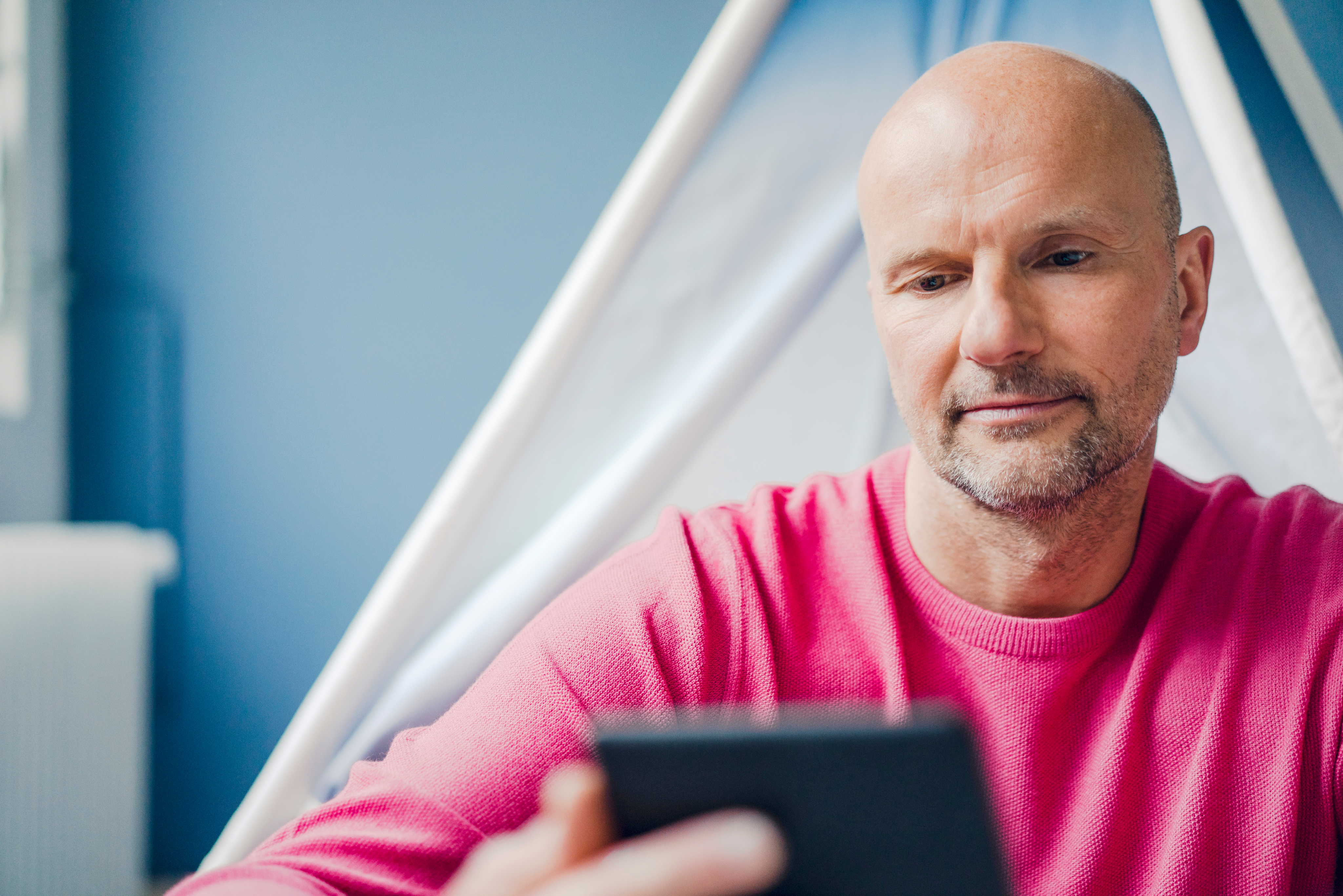 customer looking at mobile phone