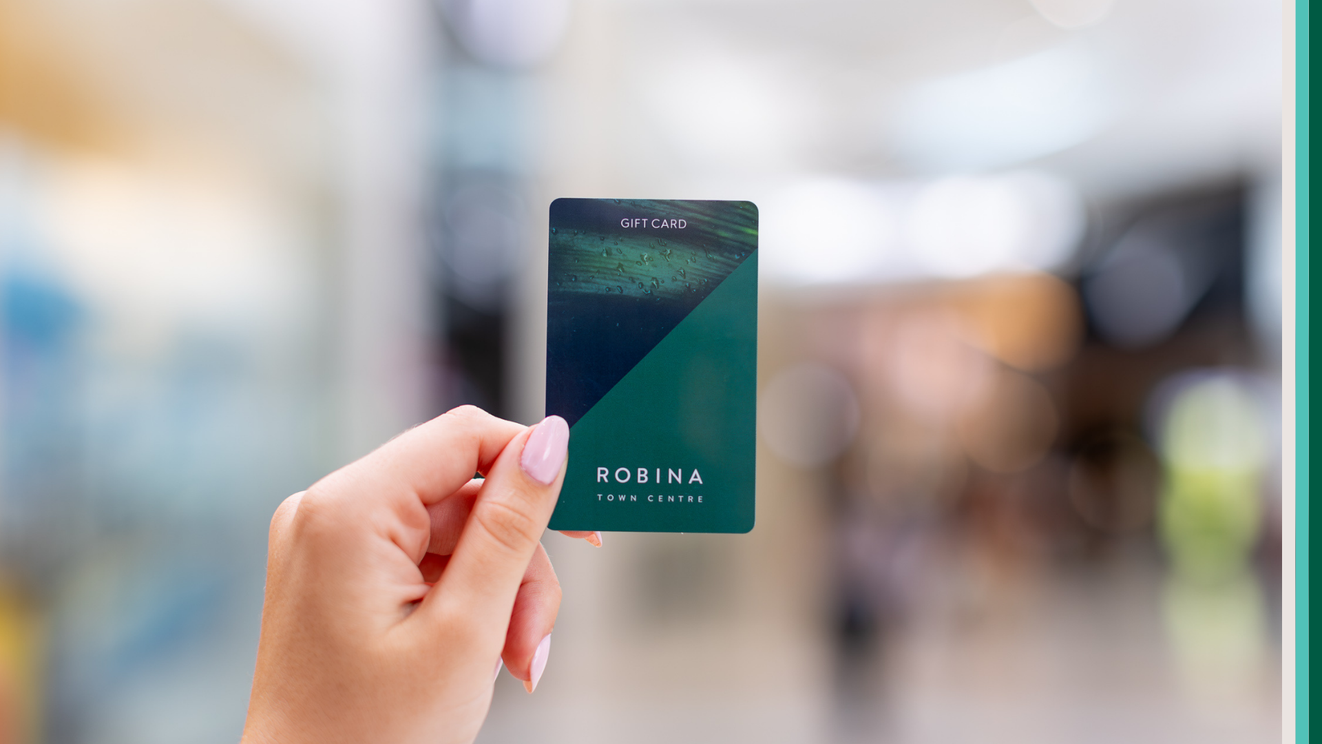 Image of Robina Town Centre gift card being held.