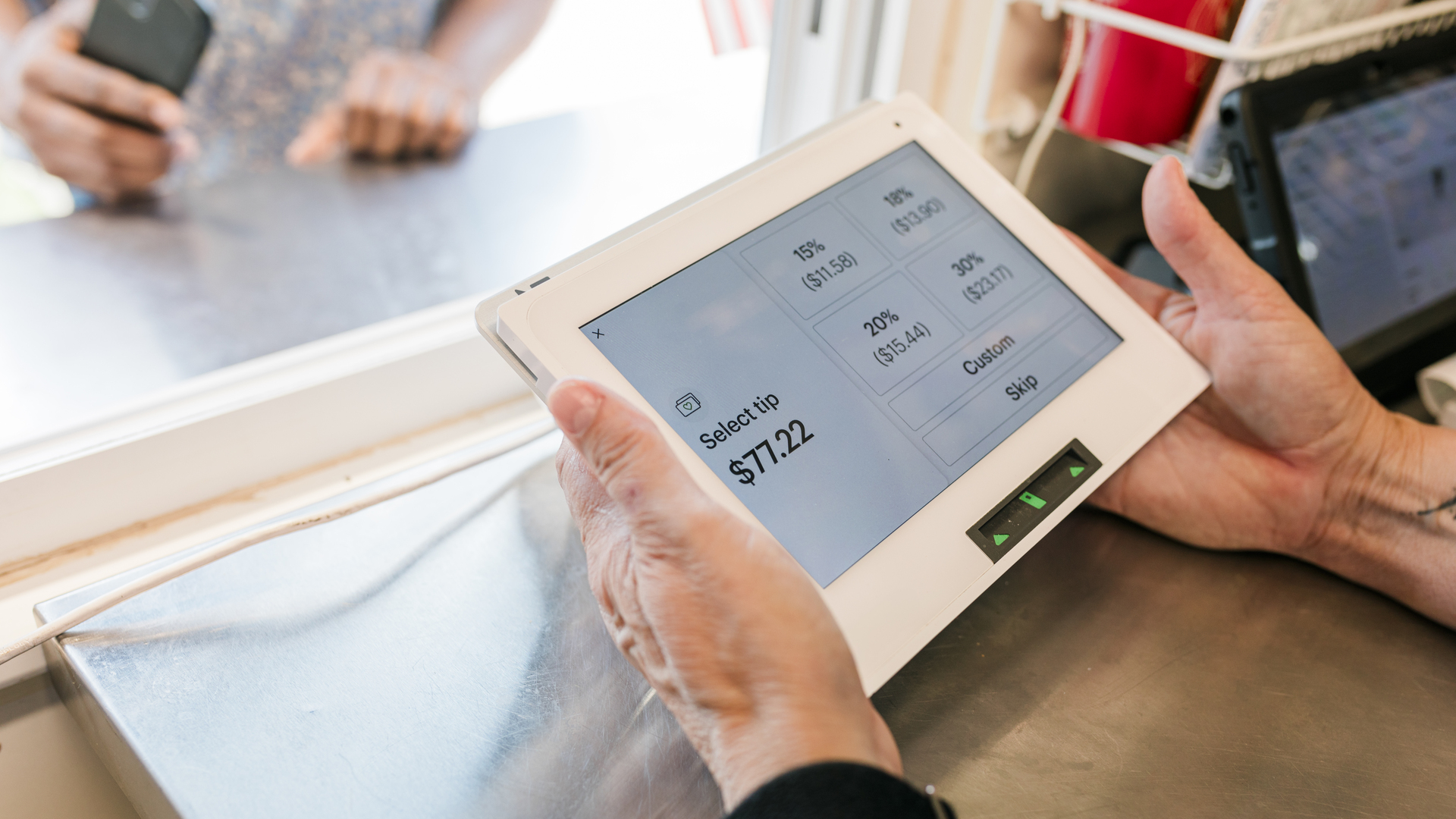 Selecting a Tip on the Payment Device