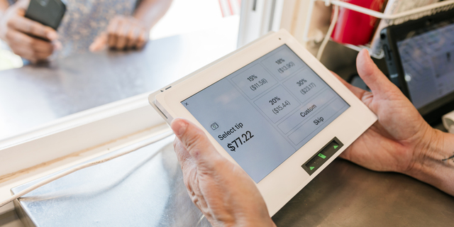 Selecting a Tip on the Payment Device