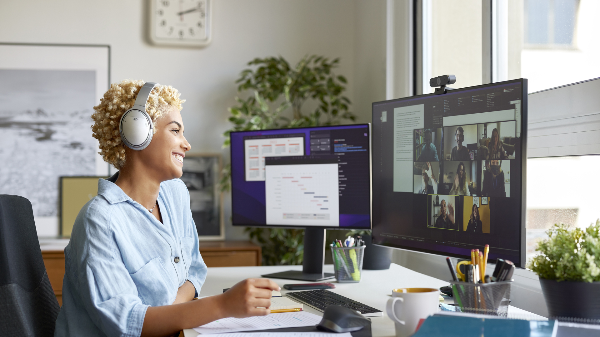 Happy Businesswoman on Video Call With Colleagues