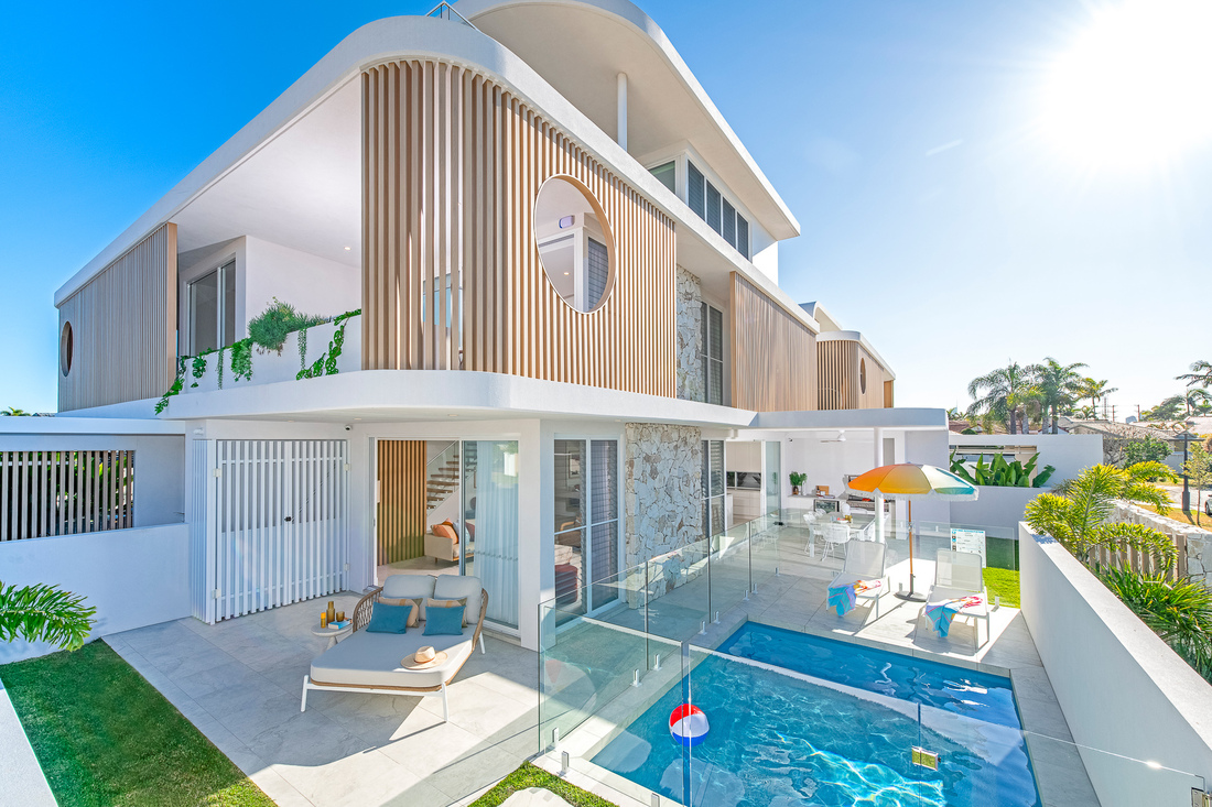 yourtown Prize Home Draw 541 external image of a 3 storey home on a corner with pool and alfresco area.