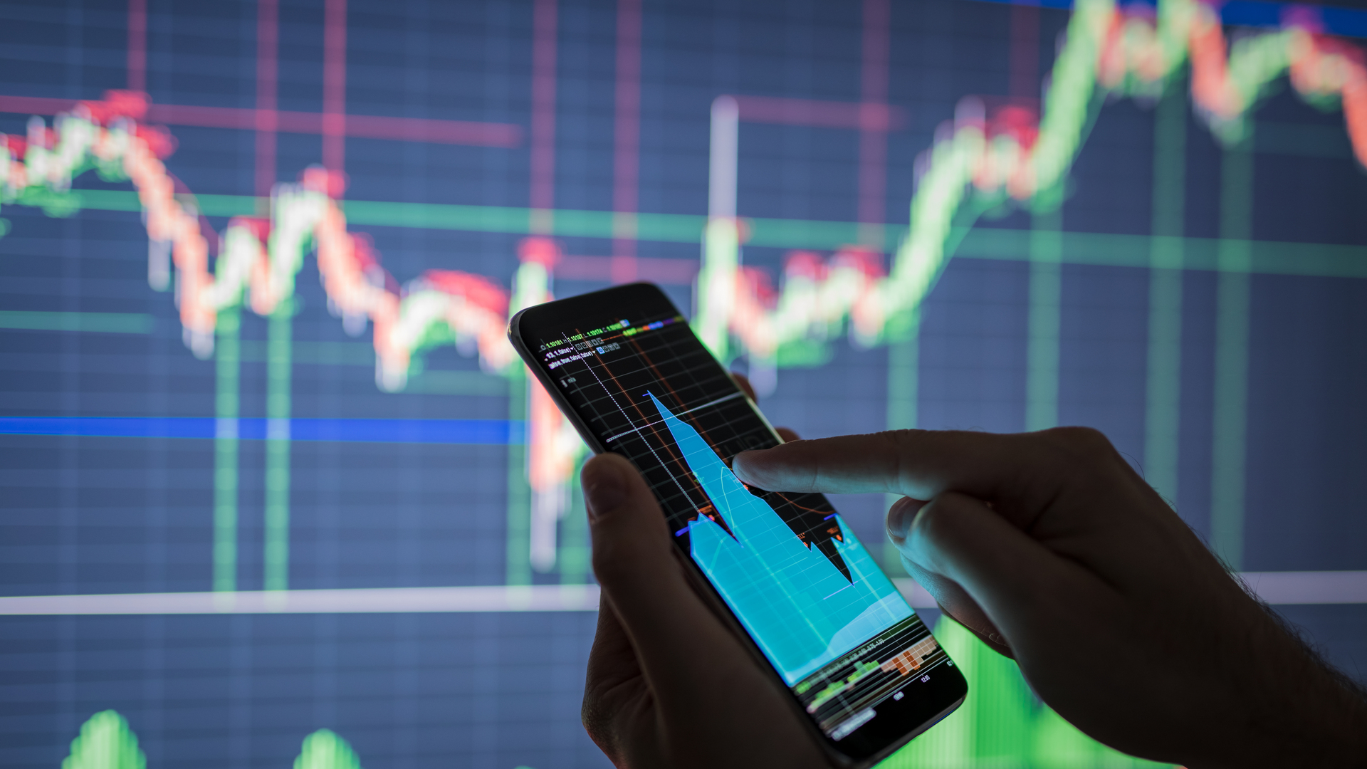 Businessman checking stock market data.