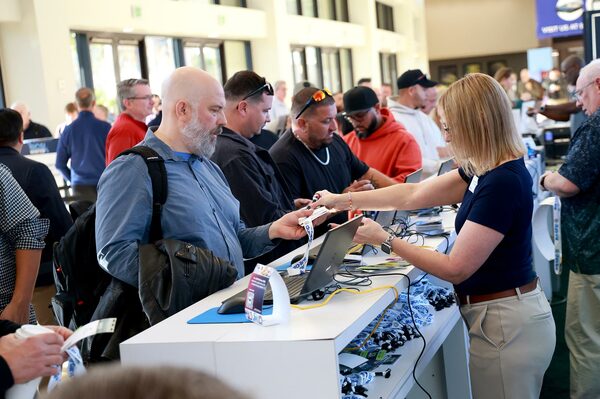 BICSI Winter Conference attendee registration and badge pickup counter at Orlando event