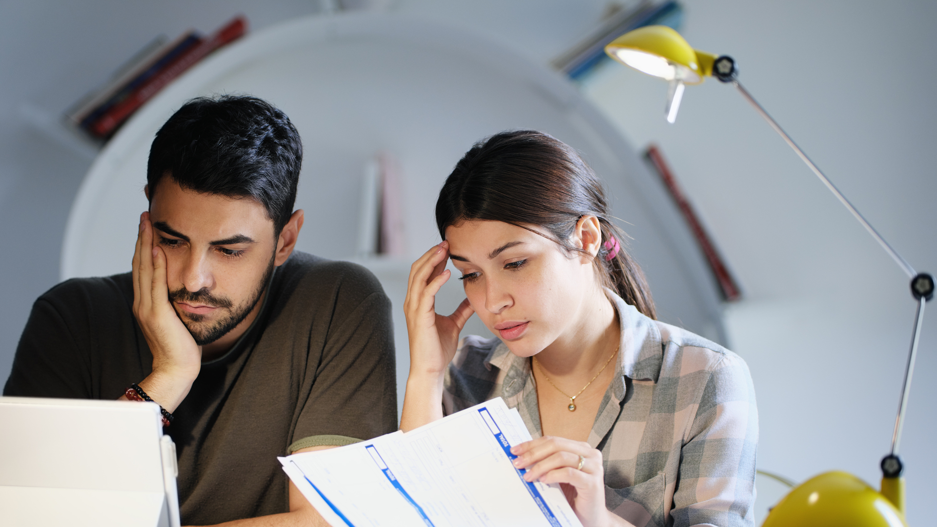 Man and Woman Worried For Taxes And Family Budget