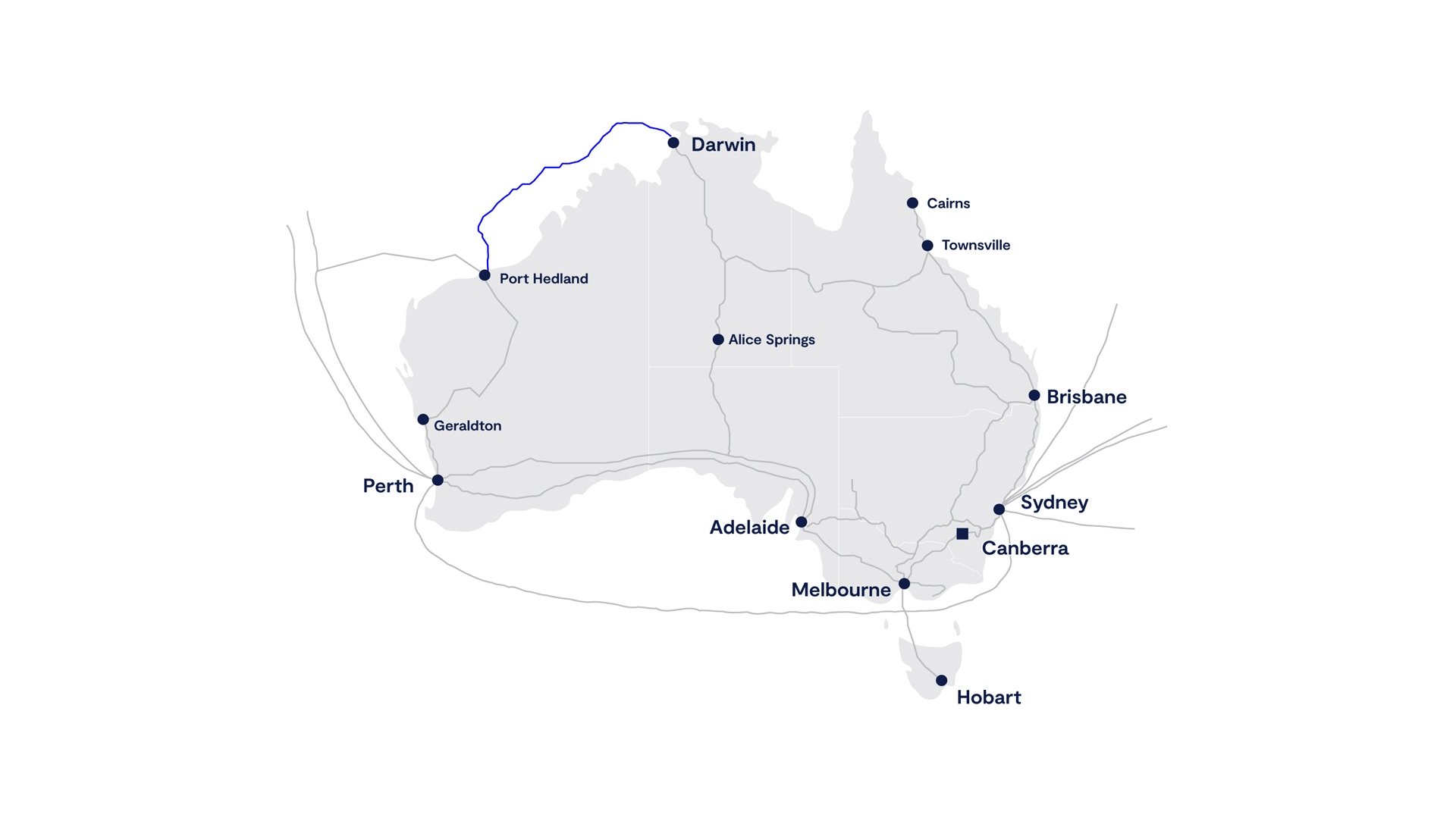 This image is a map of Australia showing major cities and a network of submarine cables. The cities marked on the map include Darwin, Port Hedland, Geraldton, Perth, Adelaide, Melbourne, Hobart, Canberra, Sydney, Brisbane, Townsville, Cairns, and Alice Springs. The submarine cable routes are depicted as lines connecting these cities along the coastline and across the ocean. This image is relevant as it illustrates the Vocus Northwest Cable System infrastructure for telecommunications in Australia. This is a Vocus-owned submarine cable network.