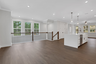dining room with hard surface flooring and 2-story foyer