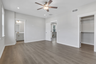 bedroom with hard surface flooring and ensuite bath