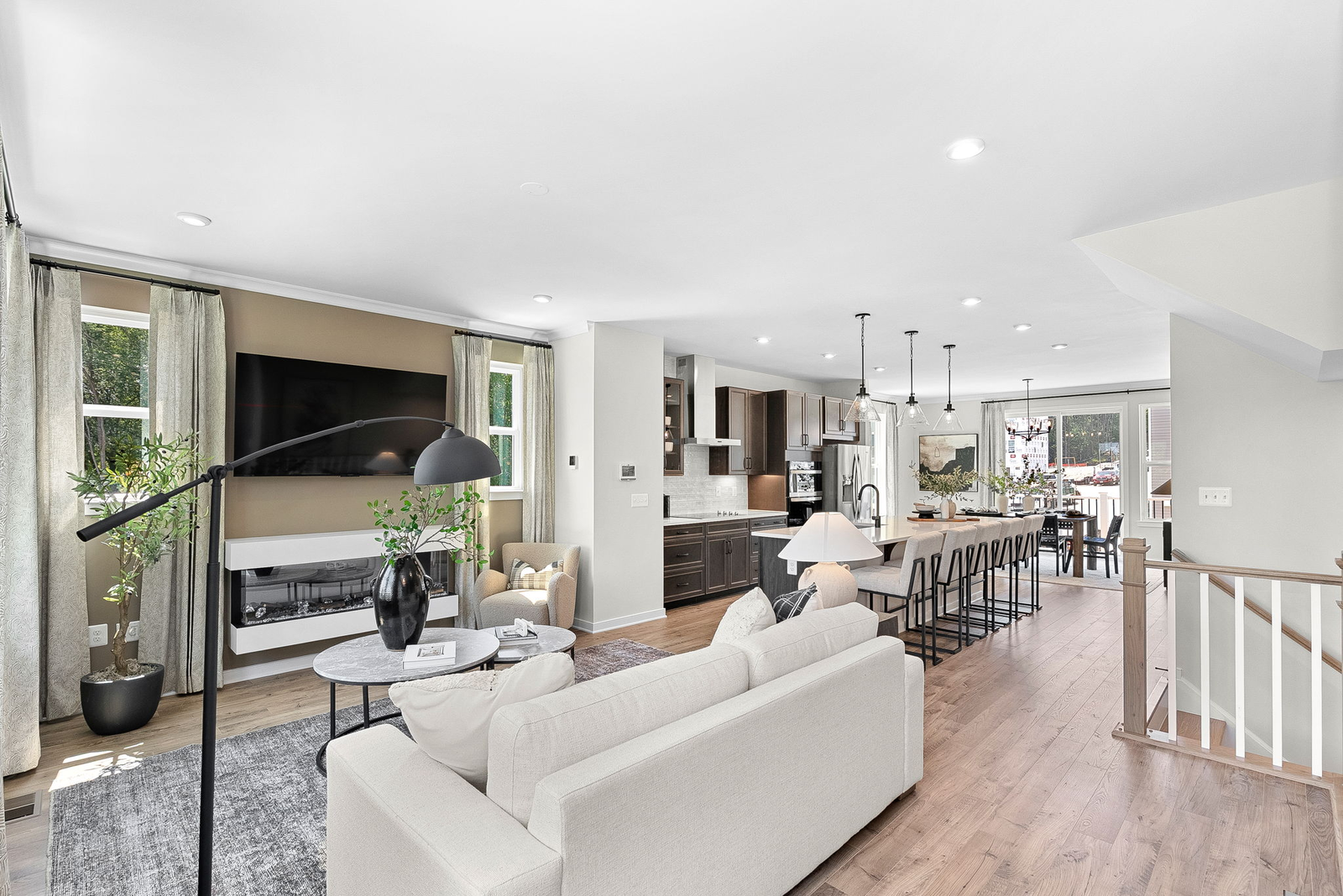great room with solid flooring & lots of light