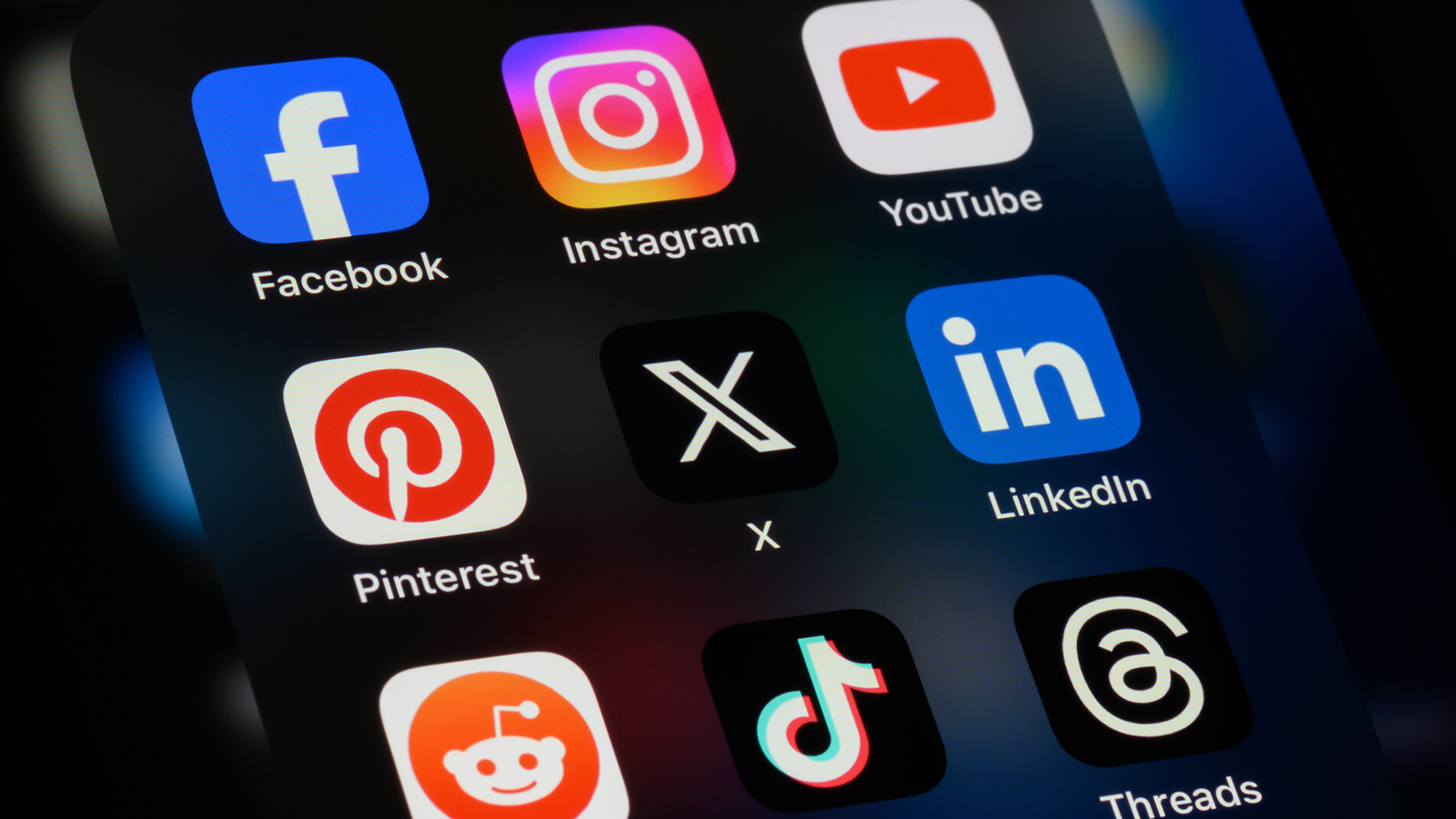 Image of phone screen with social media icons.